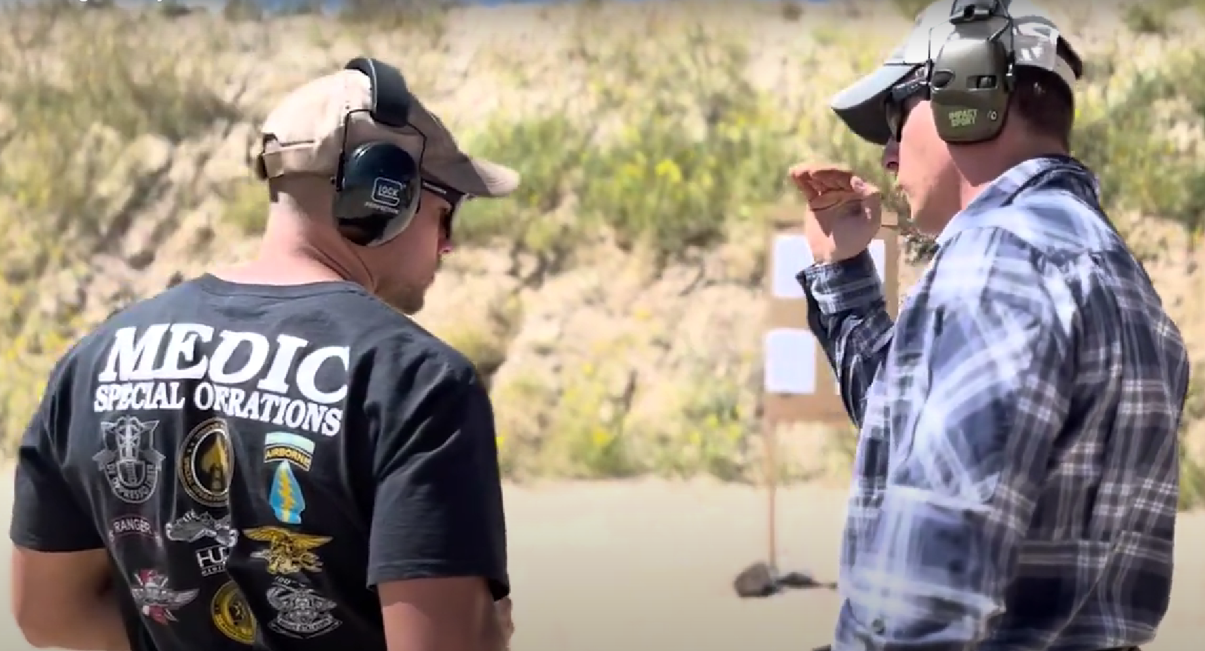 Student learning the fundamentals of pistol shooting